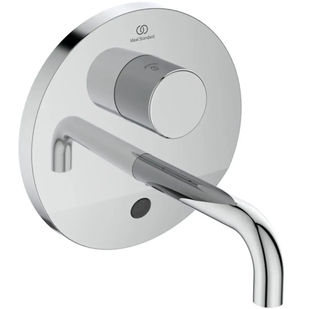 Sensor-Wandarmatur von Ideal Standard mit einem runden, glänzenden Bedienfeld und einem gebogenen Auslauf. Die Oberfläche ist aus Chrom und für wandmontierte Anwendungen konzipiert.